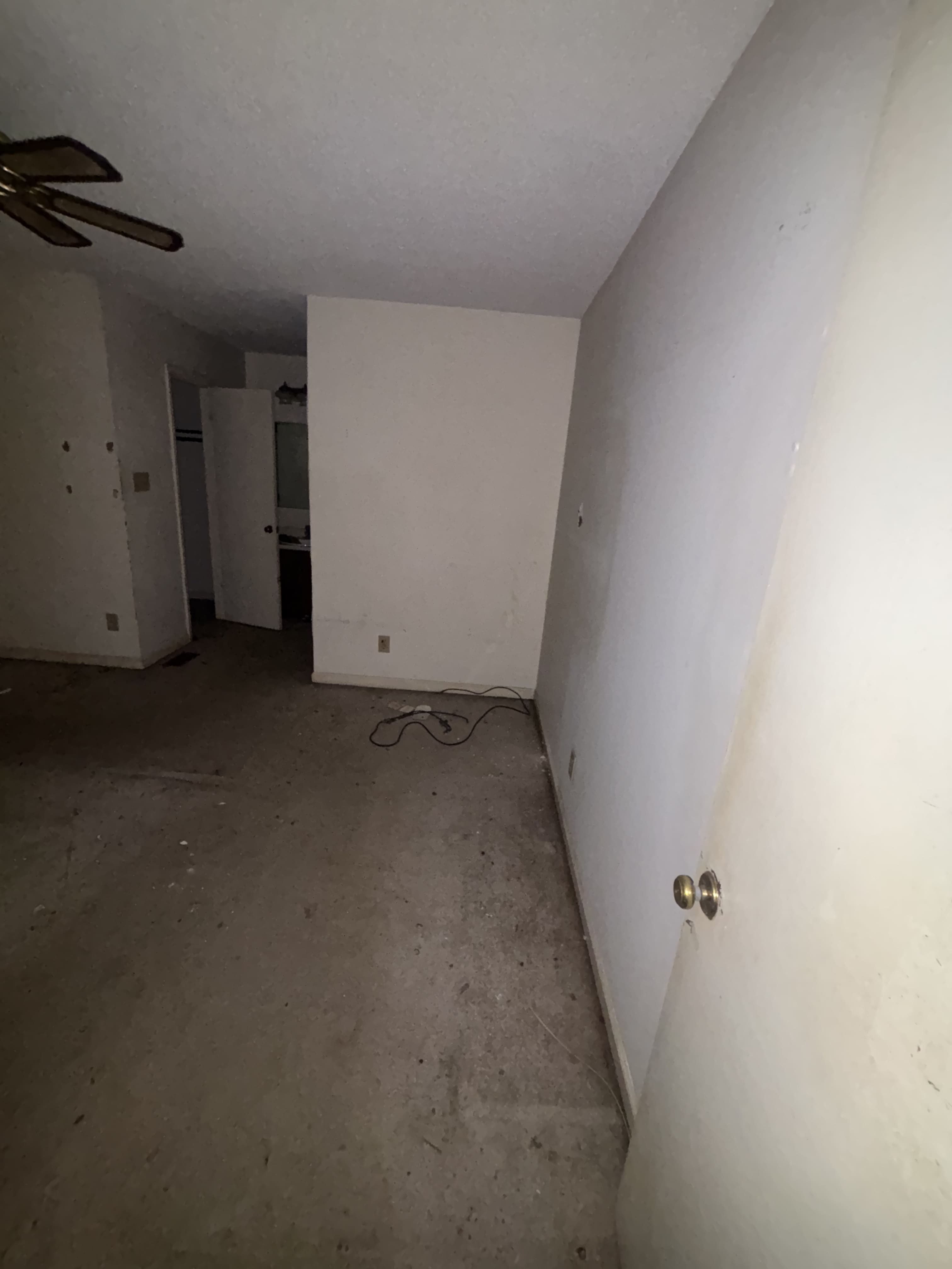 Bedroom stripped to concrete subfloor — Fayetteville NC