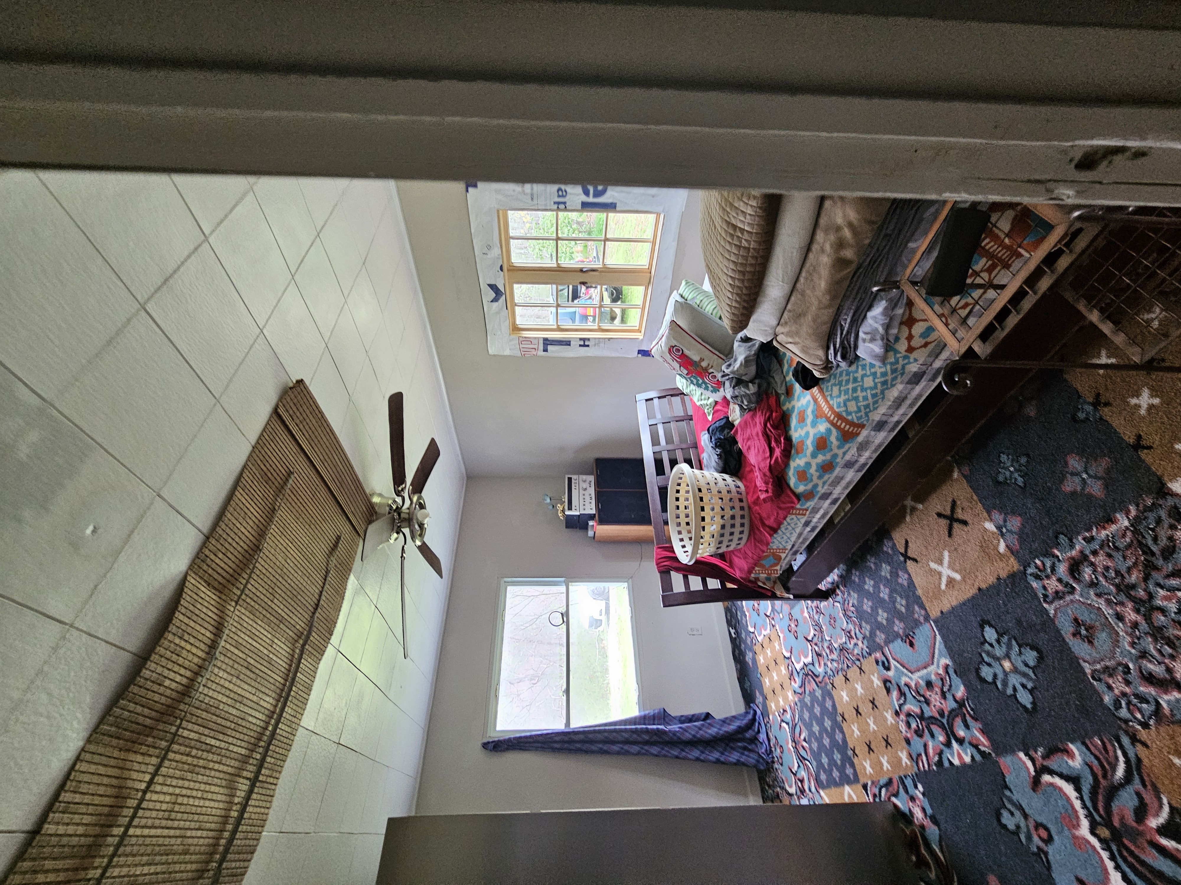 Bedroom — squatter belongings throughout, Leicester NC