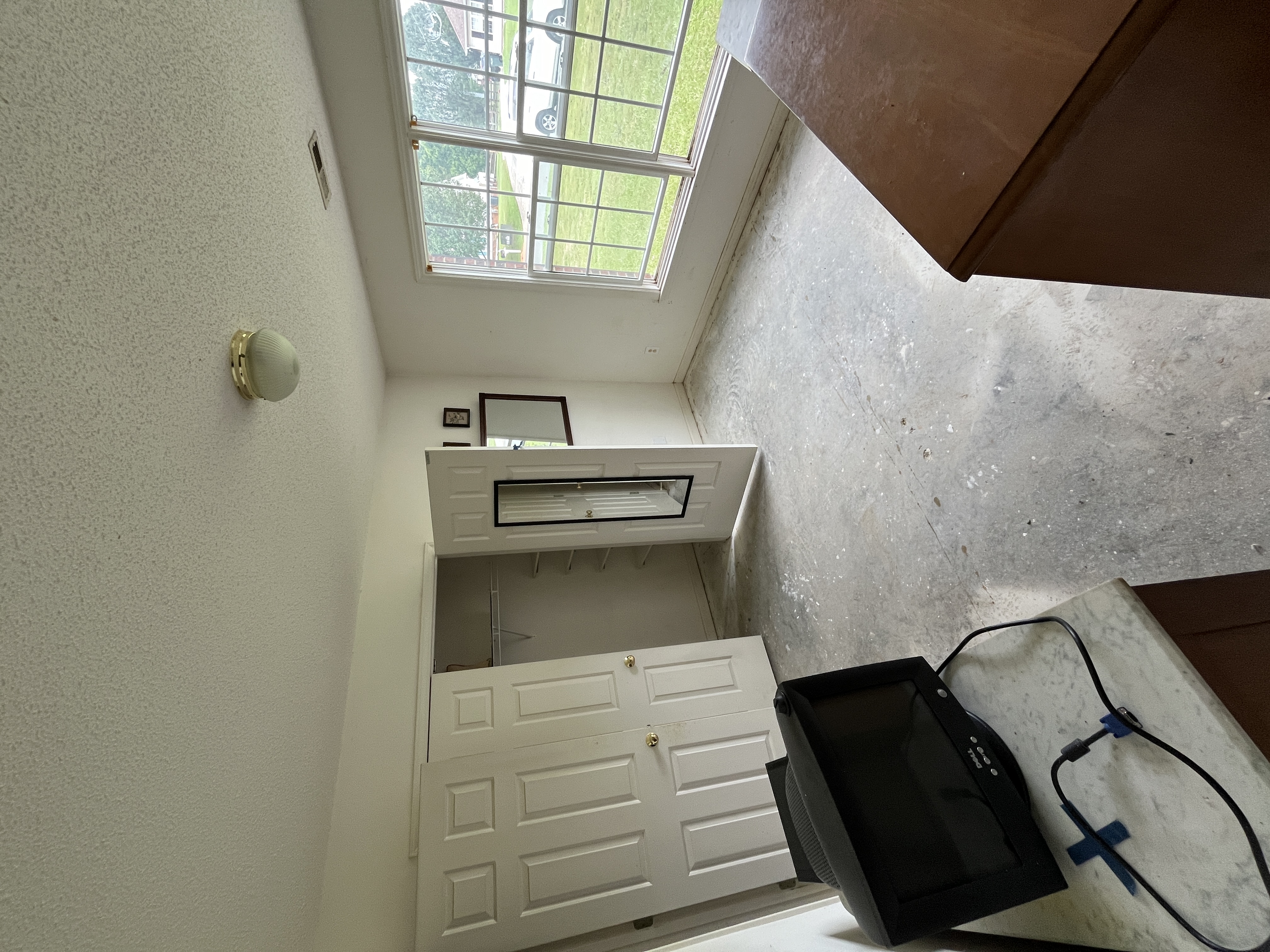 Bedroom — stripped floors, belongings left behind, Monroe NC