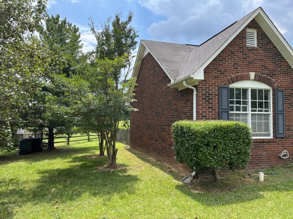 Exterior side — brick construction, rear yard, Monroe NC