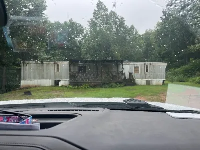 Nebo NC property — viewed from driveway approach in rain