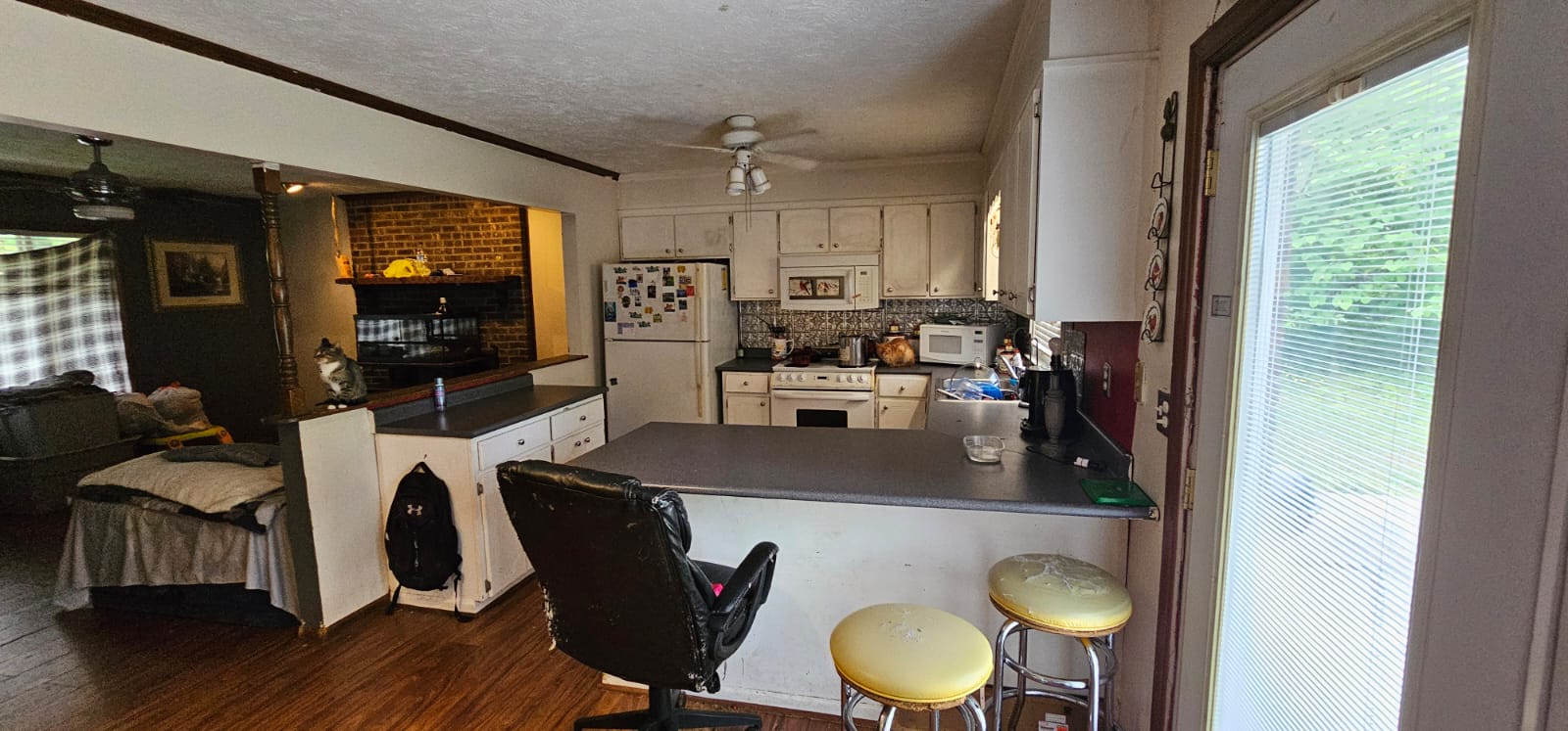 Kitchen to living open plan — dated, occupied, Rockingham NC