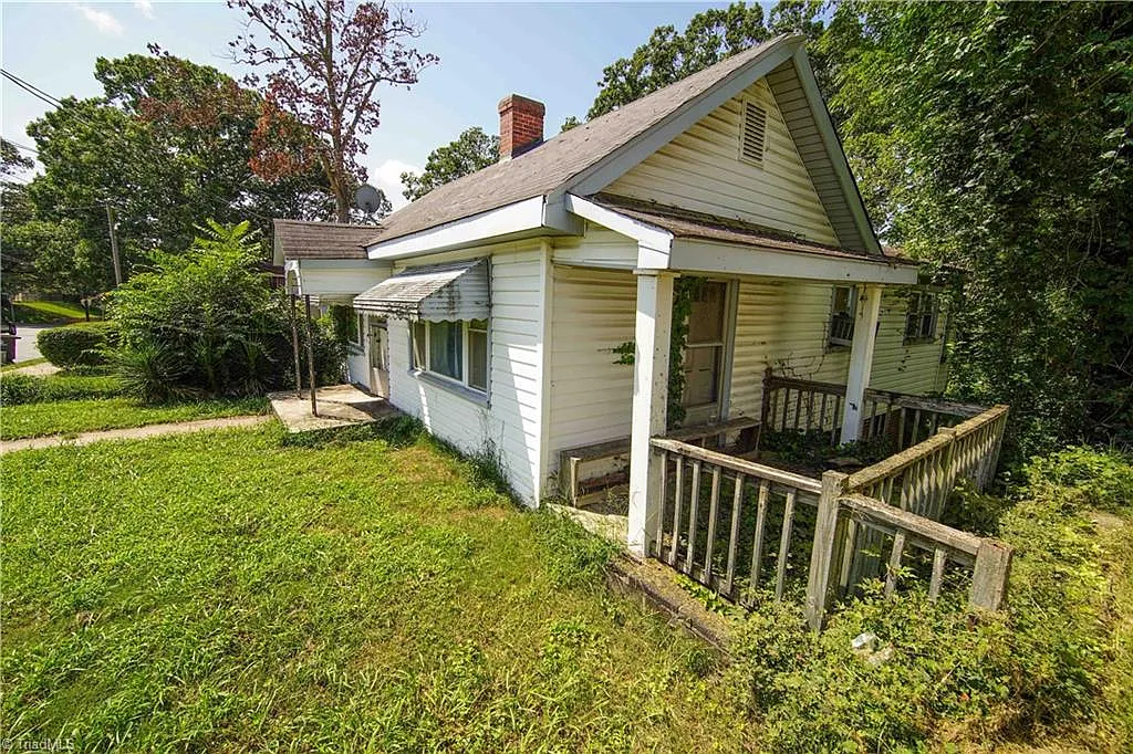 Exterior side porch — overgrown, Winston-Salem NC