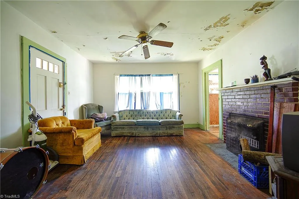 Before: Living room — ceiling damage, Winston-Salem NC